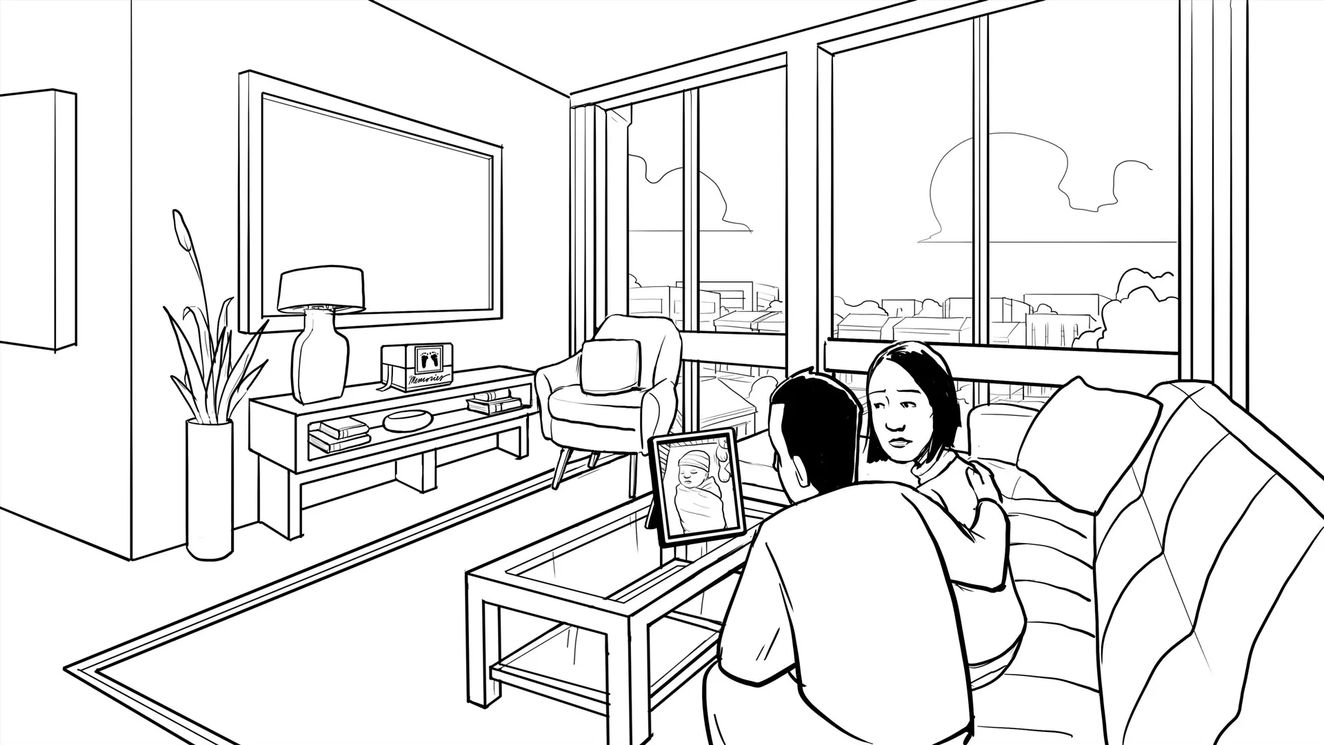 Dara and her husband at home looking at photo of Steven.