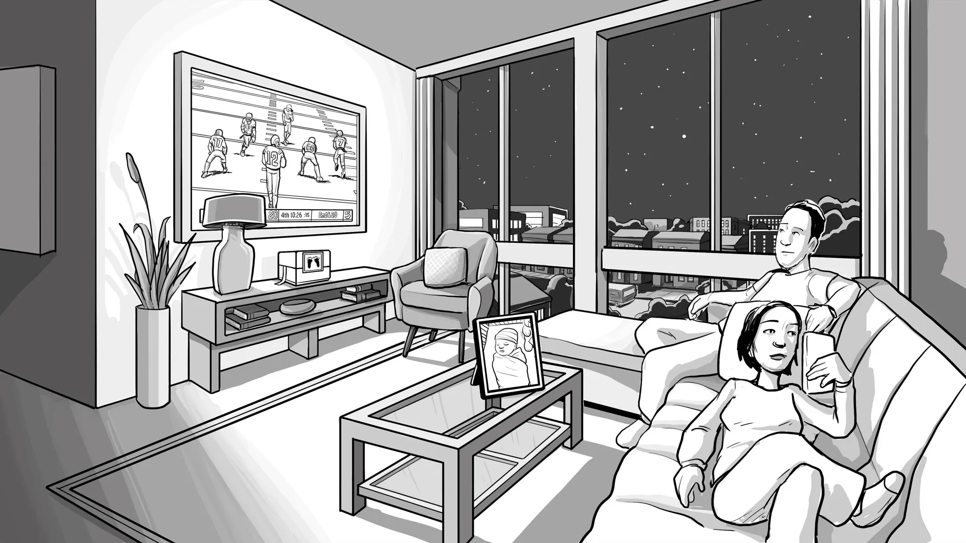 Dara and her husband on the couch watching TV and thinking.